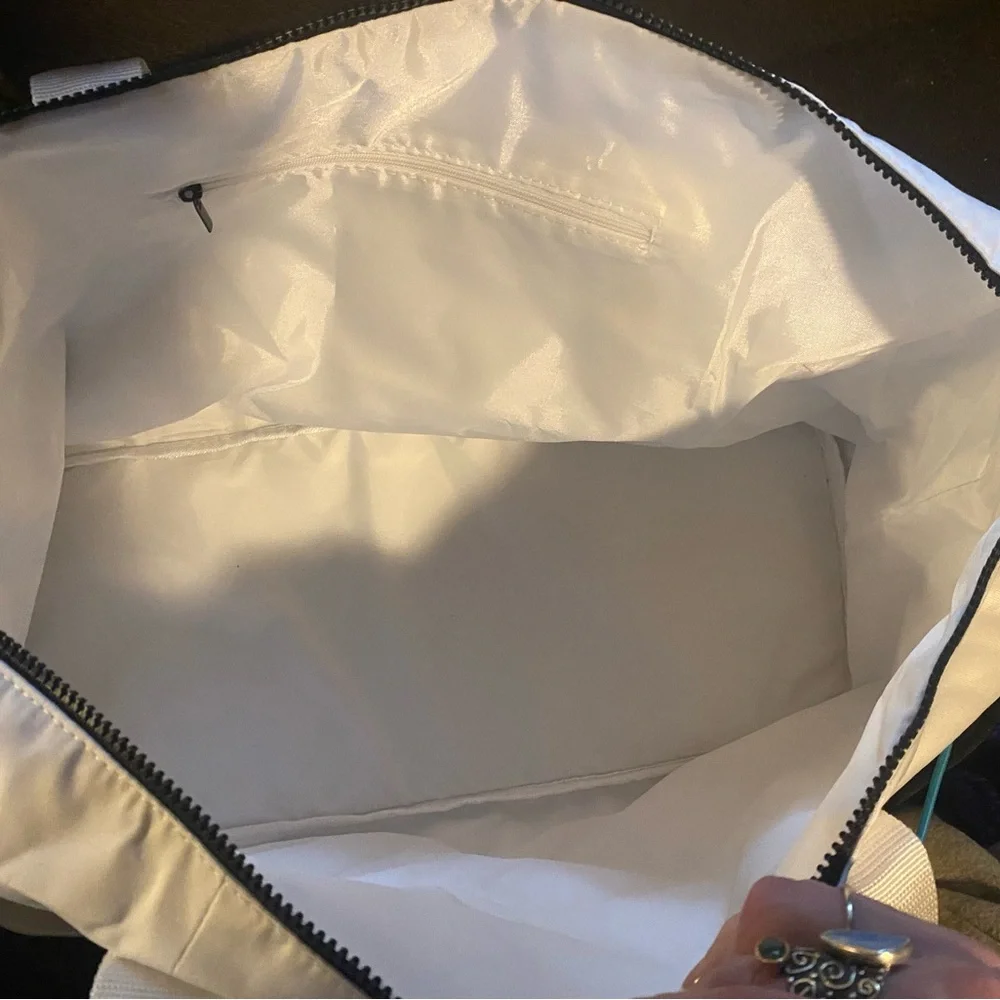 Lacoste perfumes- White Nylon Duffel Bag with Black Accents